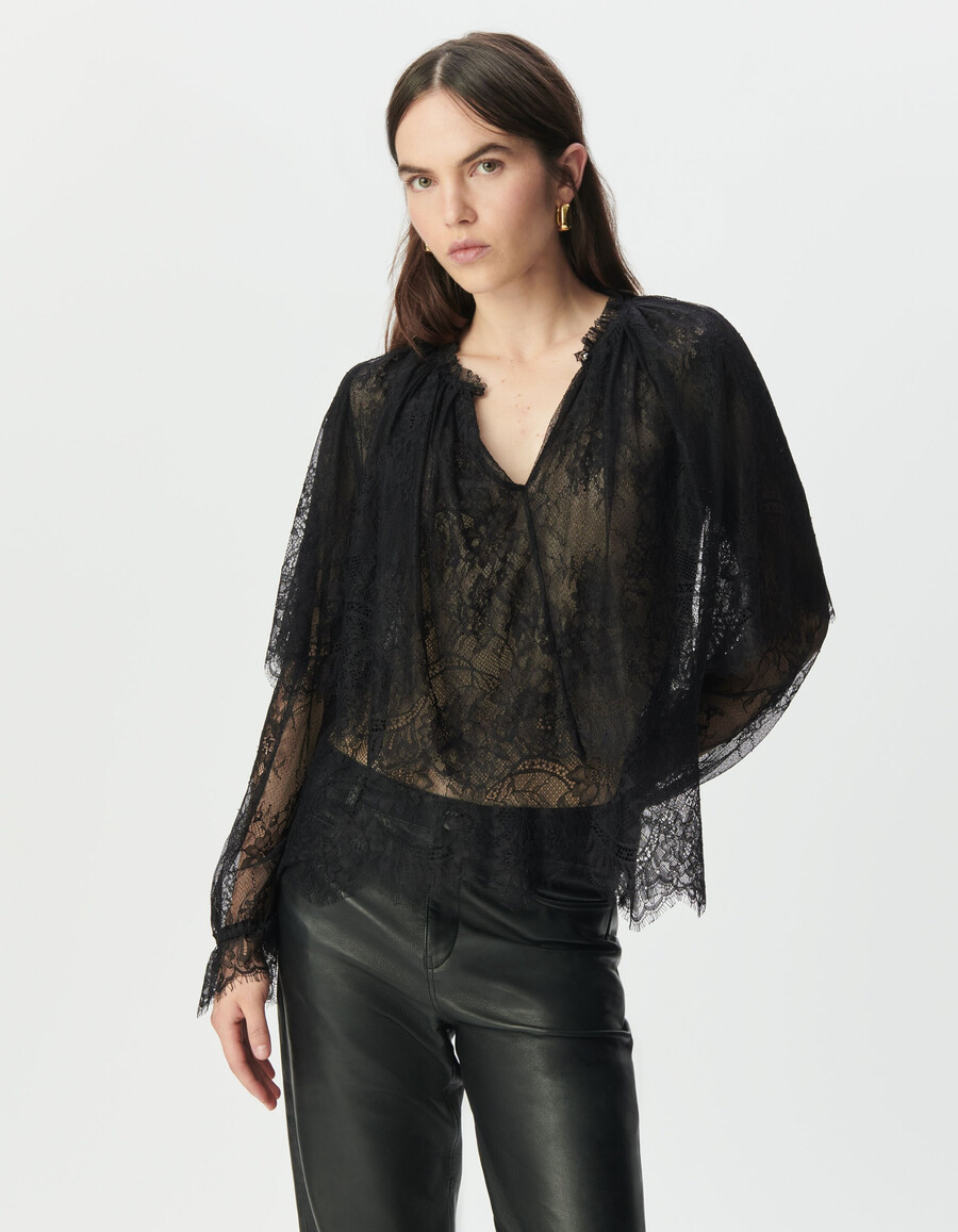 camicetta da donna in pizzo nero con ampie balze