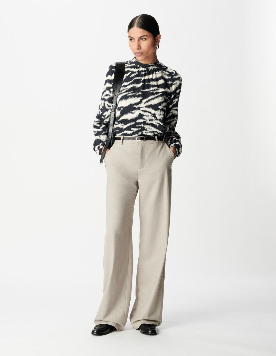 blusa da donna con stampa zebrata nera