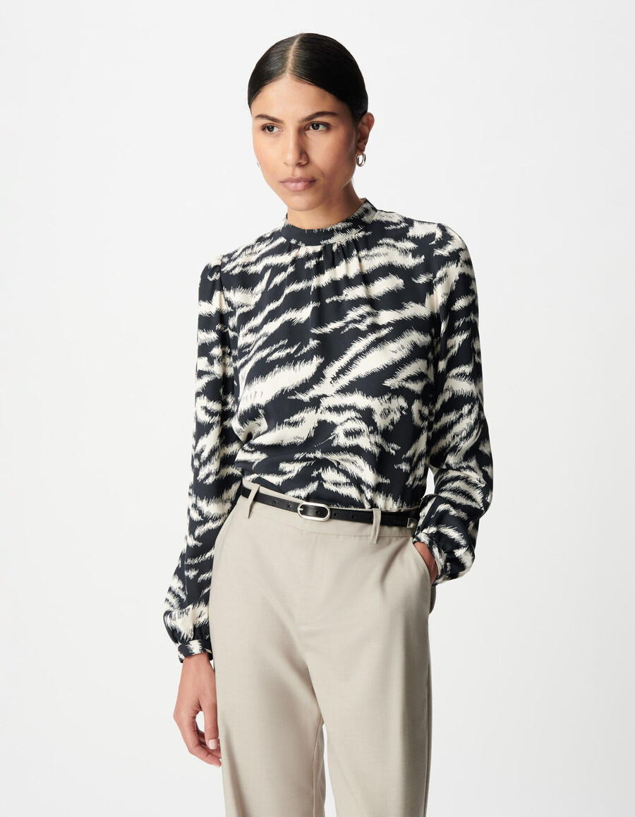 blusa da donna con stampa zebrata nera
