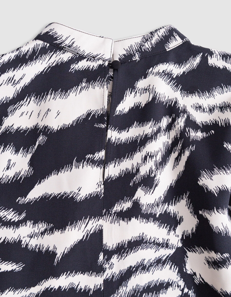 blusa da donna con stampa zebrata nera