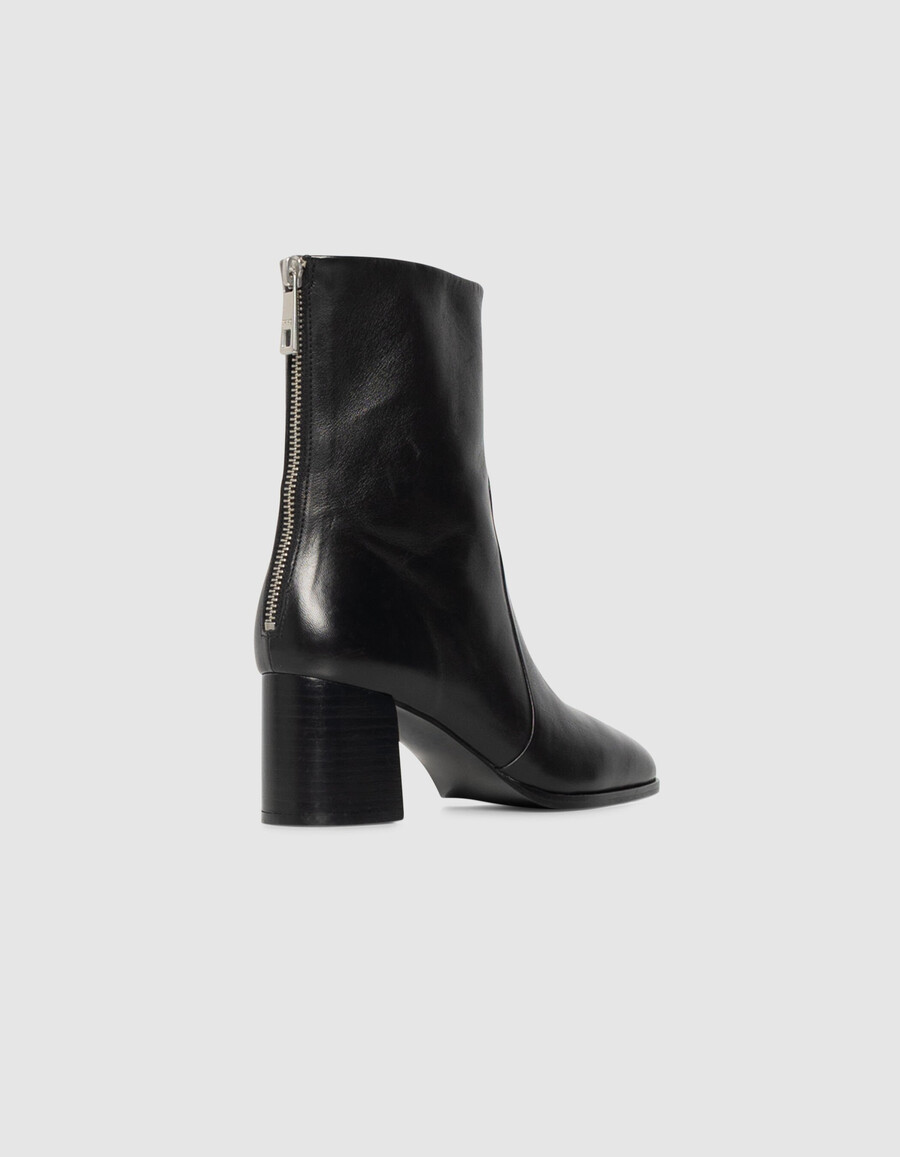 stivali con tacco e cerniera in pelle nera da donna