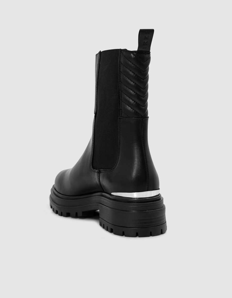 stivali chelsa in pelle nera con fermaglio in metallo da donna