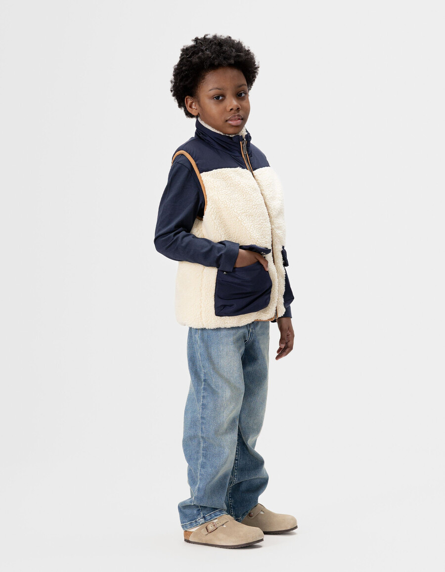giacca imbottita reversibile senza maniche color écru e blu navy per bambini