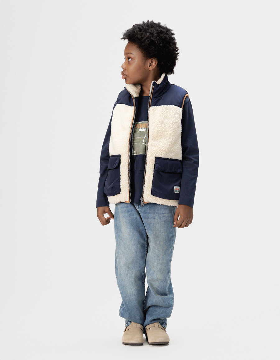 giacca imbottita reversibile senza maniche color écru e blu navy per bambini