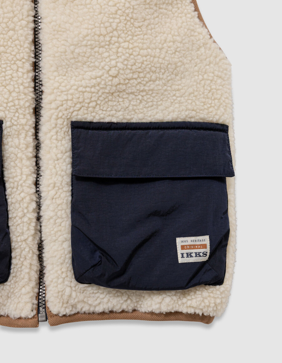 giacca imbottita reversibile senza maniche color écru e blu navy per bambini