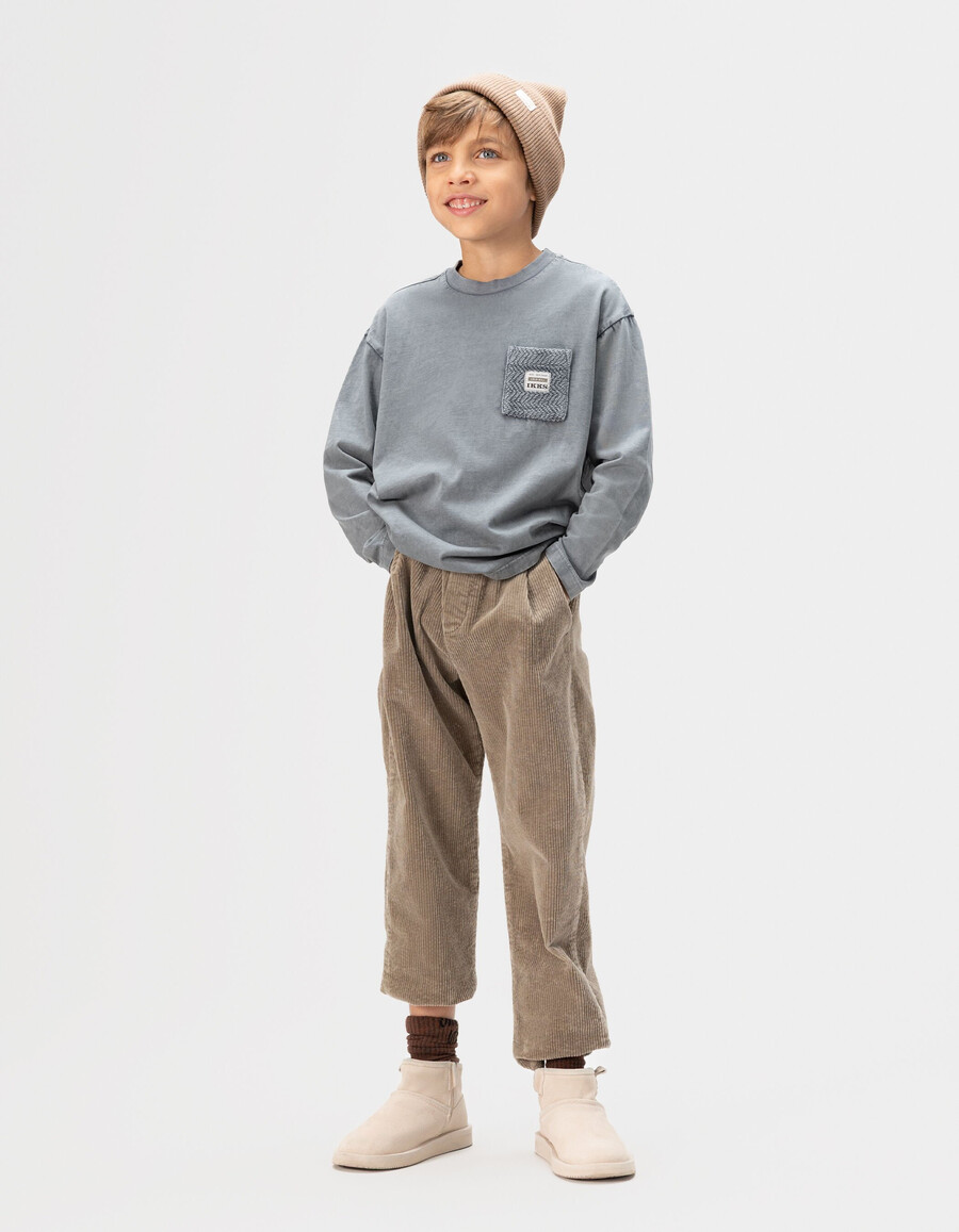 maglietta a maniche lunghe in cotone biologico blu per bambini tasca in maglia
