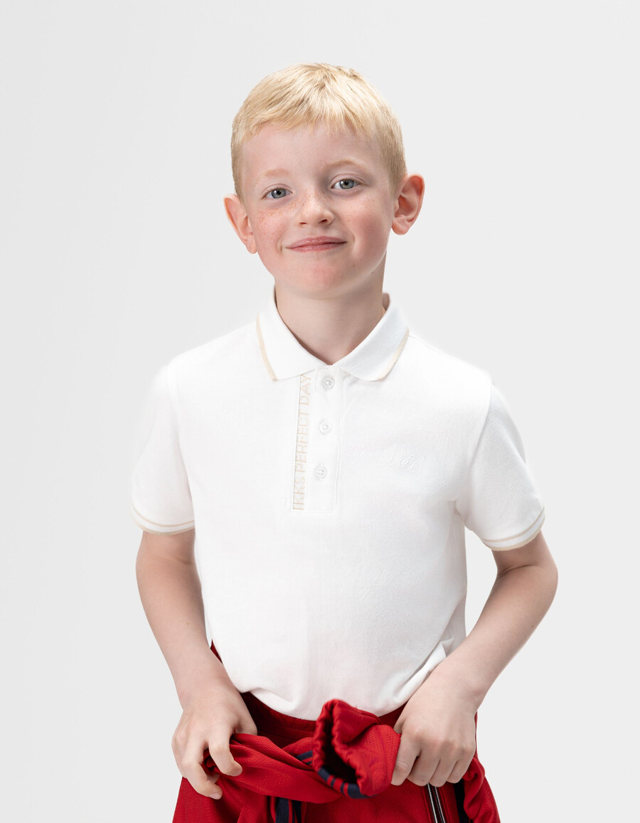 polo bianca in cotone con coste a righe per bambini