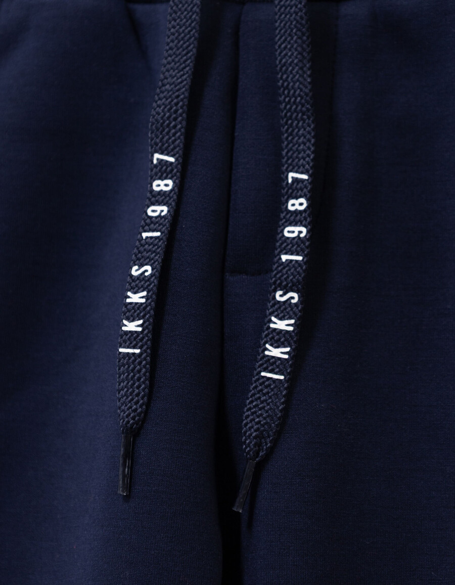 pantaloni da jogging blu navy da bambino con coulisse con lettere