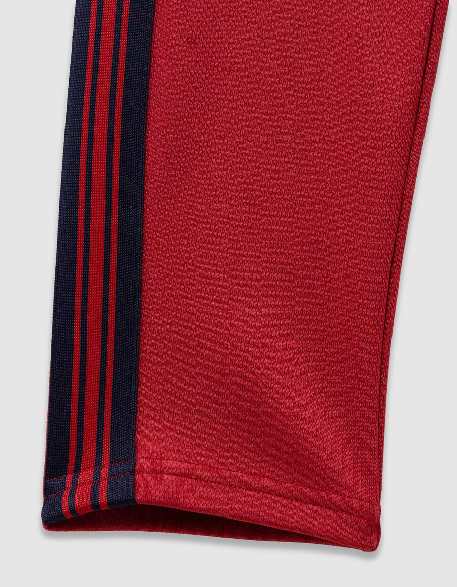 pantaloni da jogging rossi con strisce blu navy per ragazzi