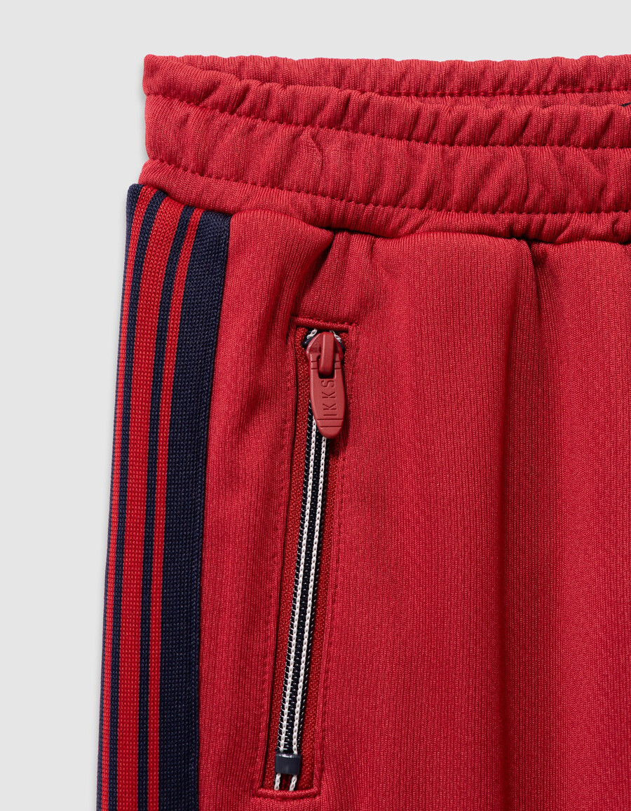 pantaloni da jogging rossi con strisce blu navy per ragazzi