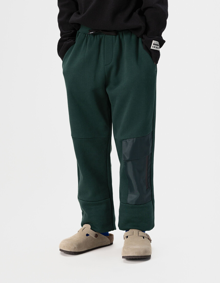 pantaloni da jogging verdi da bambino con tasca in tessuto misto