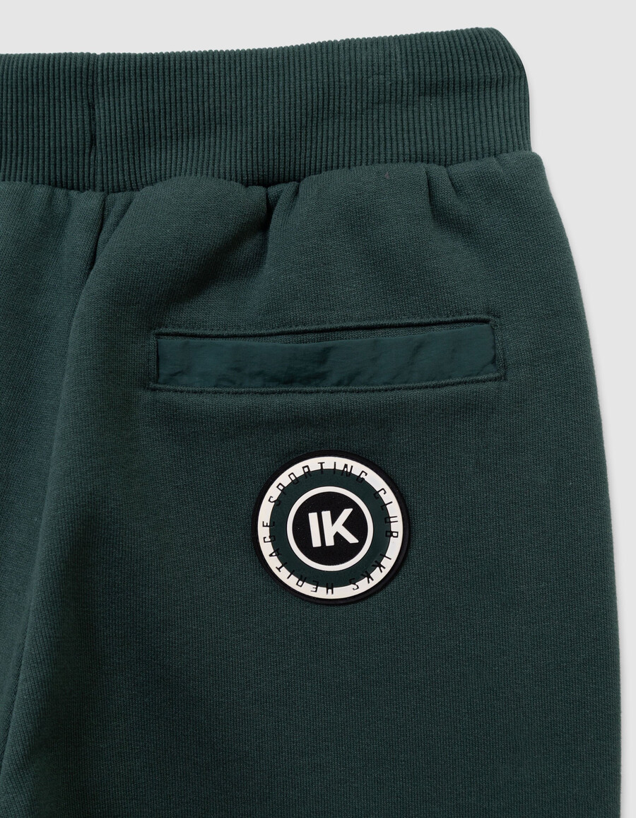 pantaloni da jogging verdi da bambino con tasca in tessuto misto