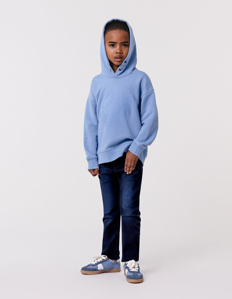 jeans slim blu-neri da ragazzo con impunture a zig-zag