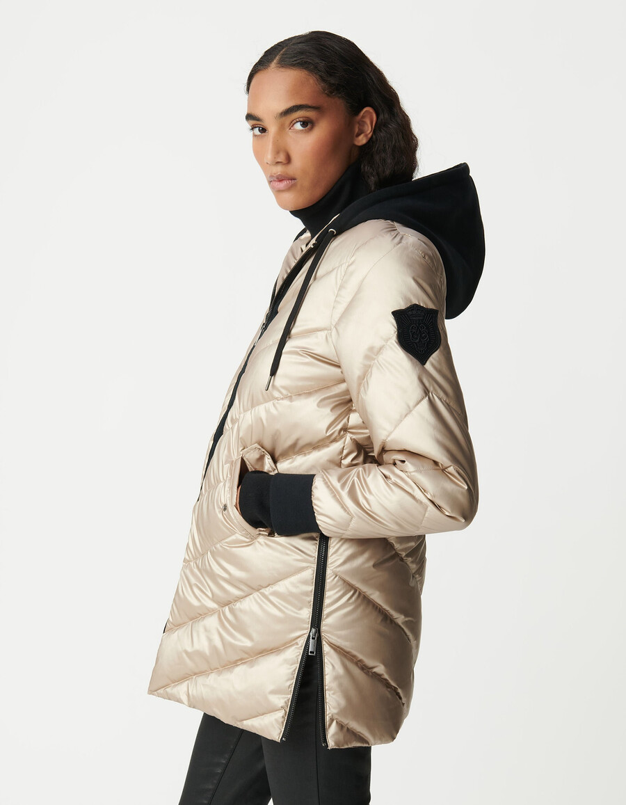 giacca imbottita da donna color oro con cappuccio in pile nero