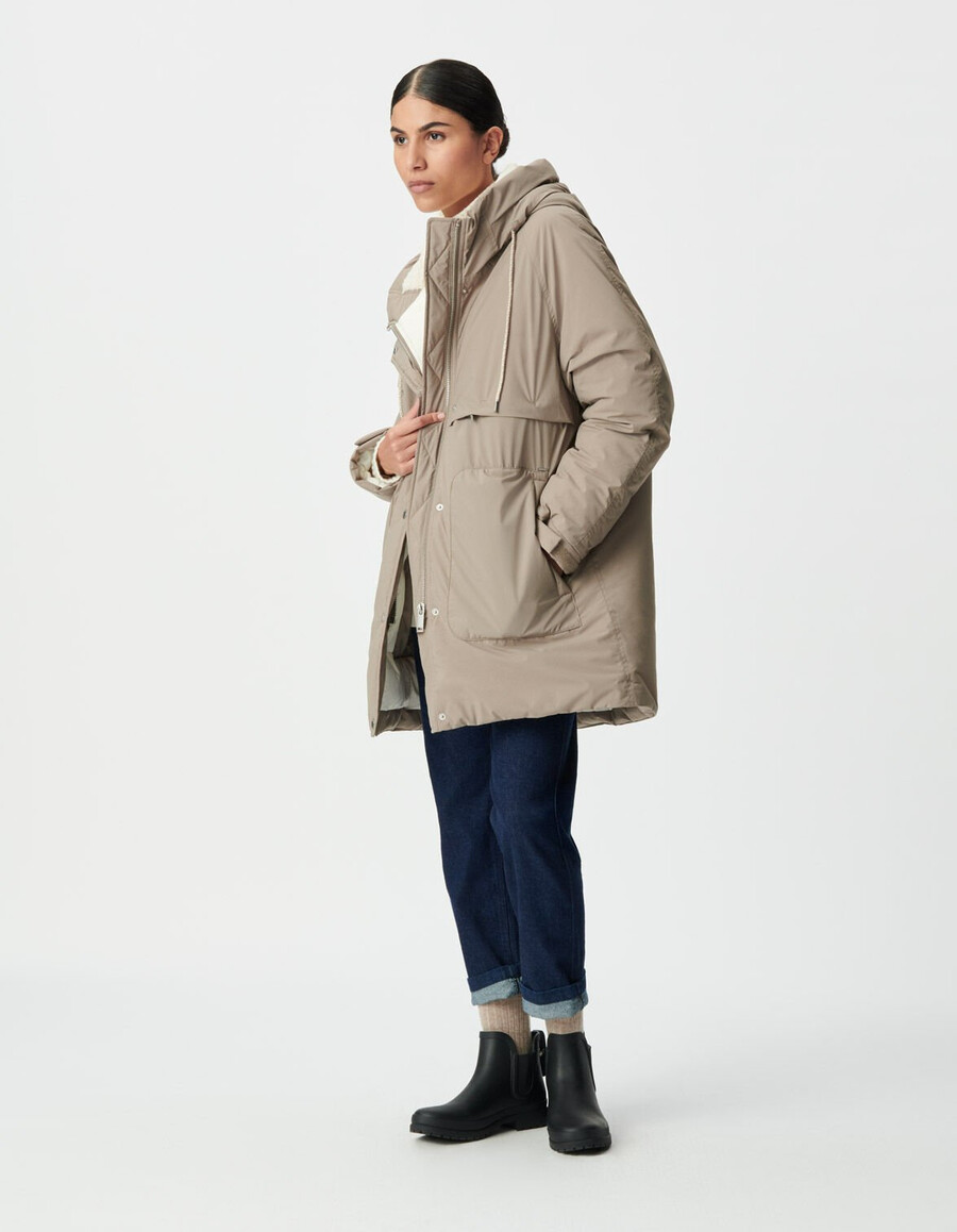 giacca imbottita beige da donna con cappuccio foderato in pelliccia