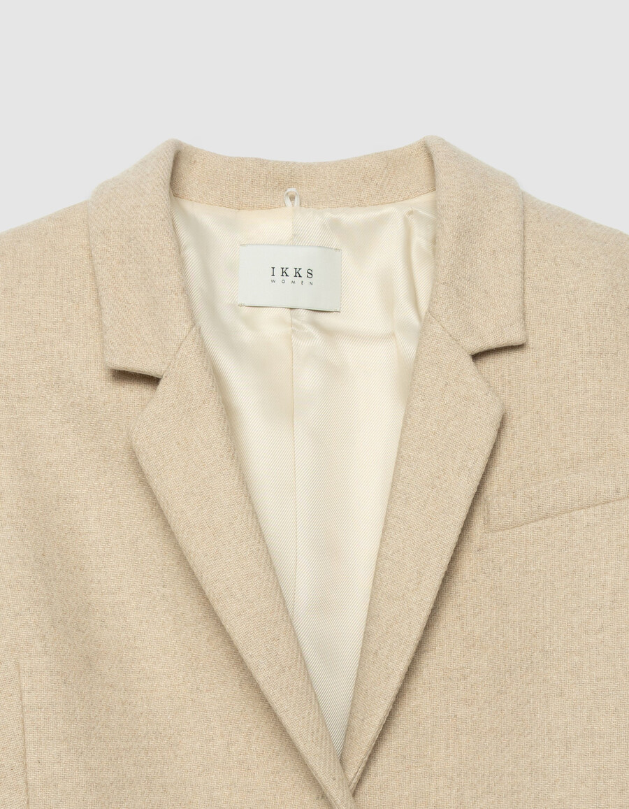 cappotto beige da donna con cappuccio staccabile