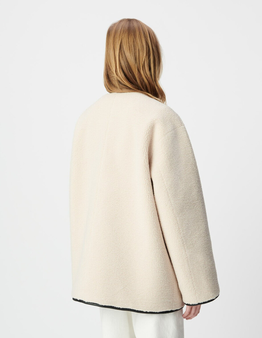 cappotto reversibile in sherpa nero ed écru da donna