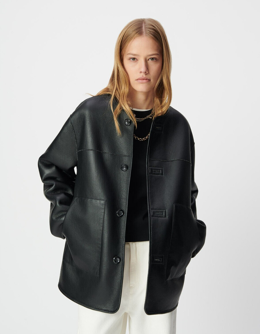 cappotto reversibile in sherpa nero ed écru da donna