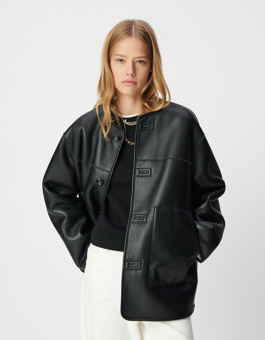 cappotto reversibile in sherpa nero ed écru da donna