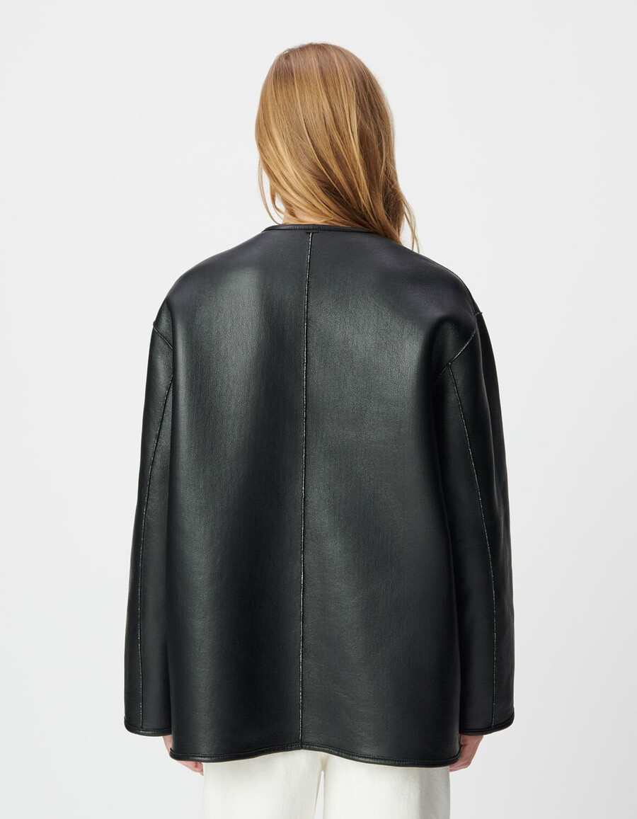 cappotto reversibile in sherpa nero ed écru da donna