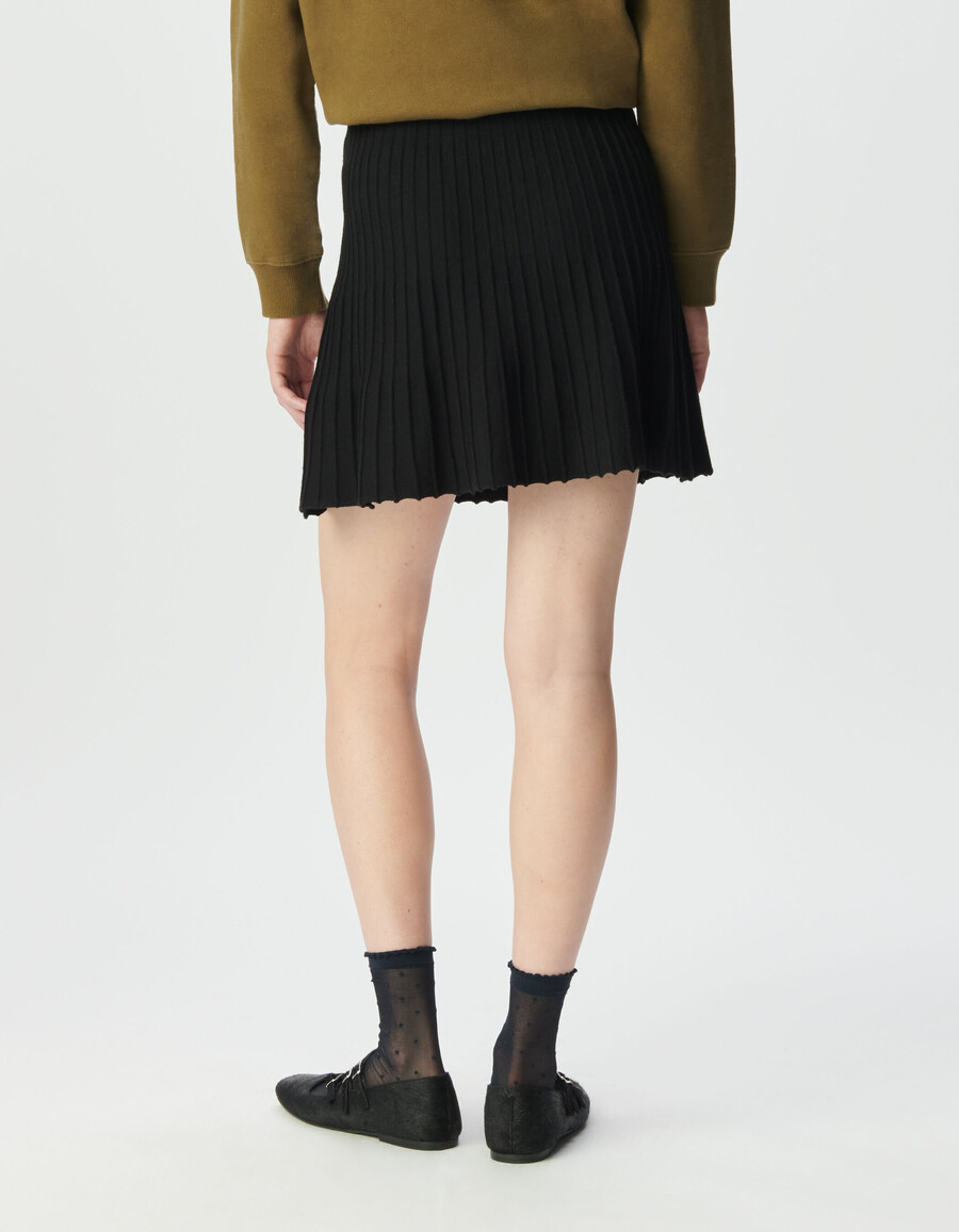 gonna corta plissettata in maglia nera da donna