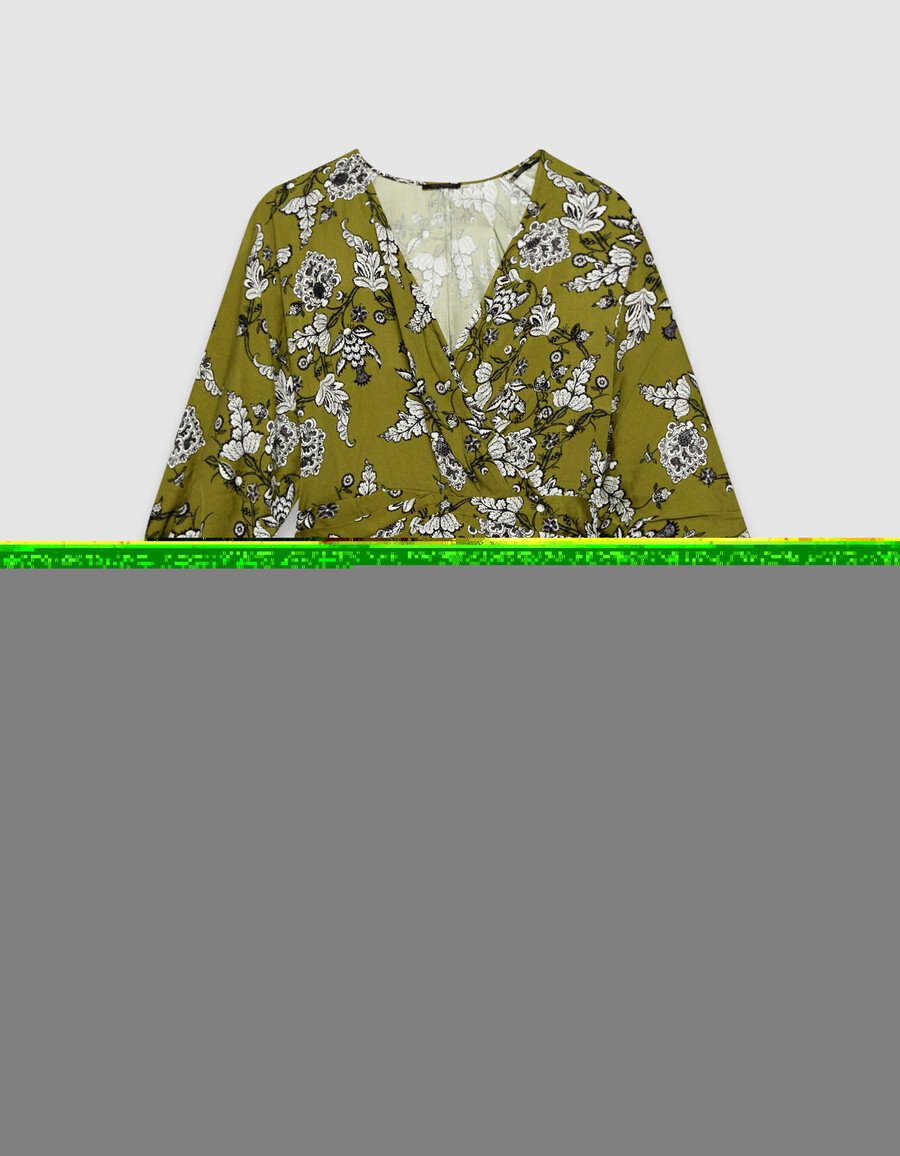 abito verde fluido da donna con stampa floreale