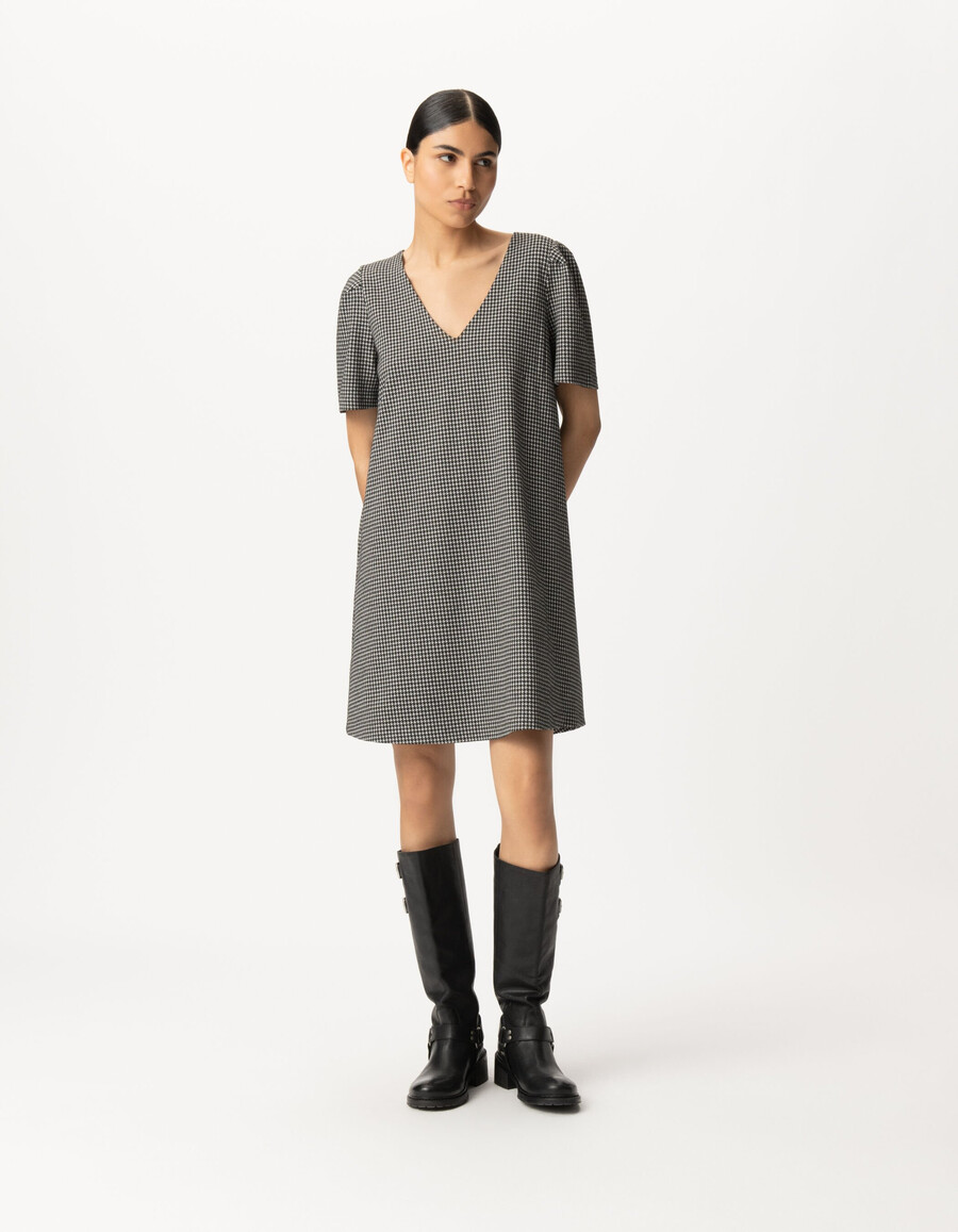abito reversibile da donna con motivo pied de poule nero davantidietro