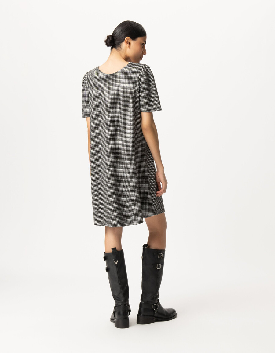 abito reversibile da donna con motivo pied de poule nero davantidietro