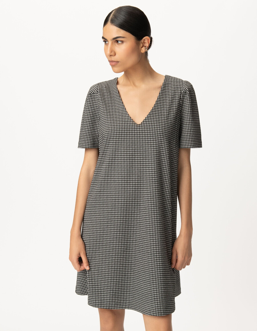 abito reversibile da donna con motivo pied de poule nero davantidietro