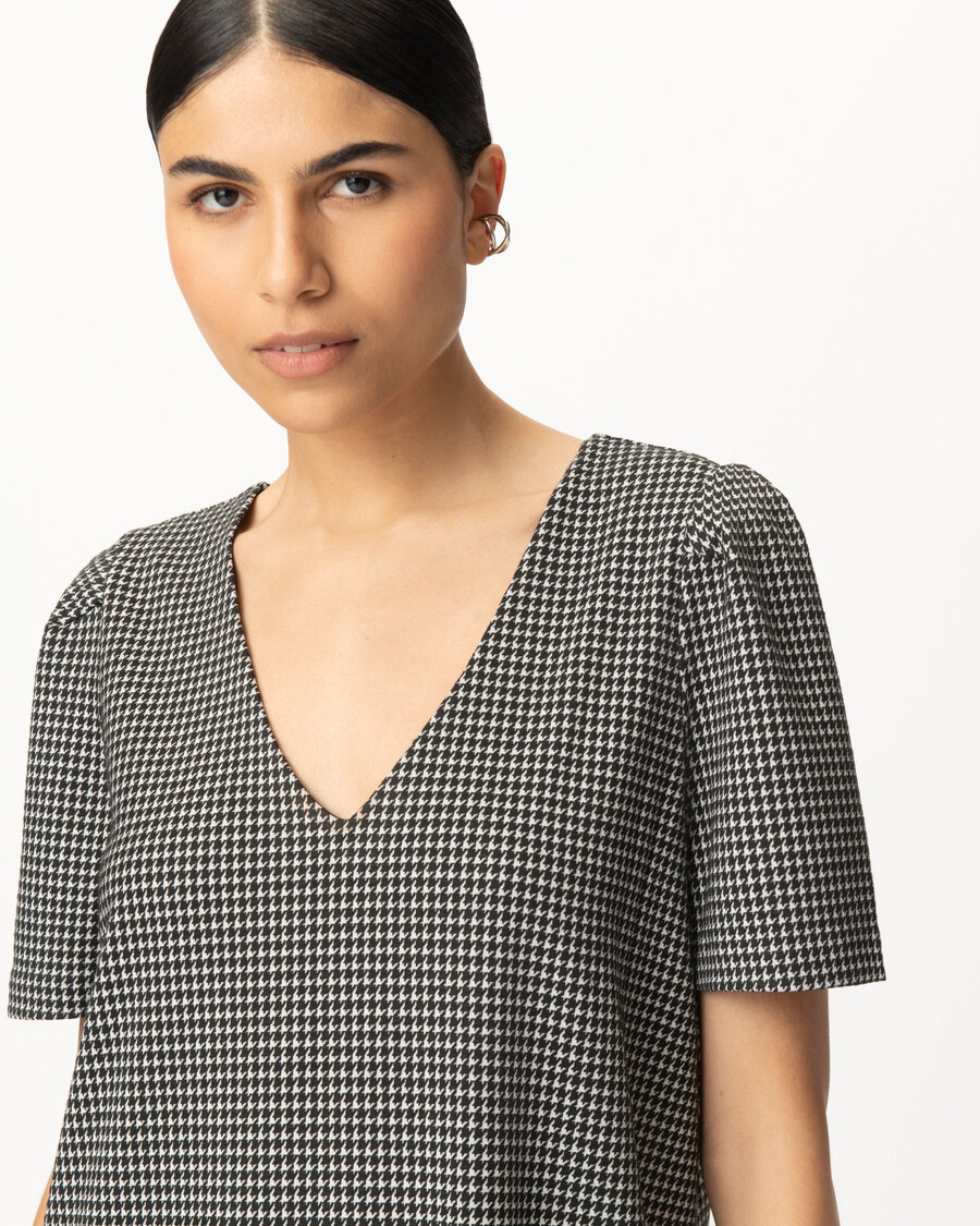 abito reversibile da donna con motivo pied de poule nero davantidietro