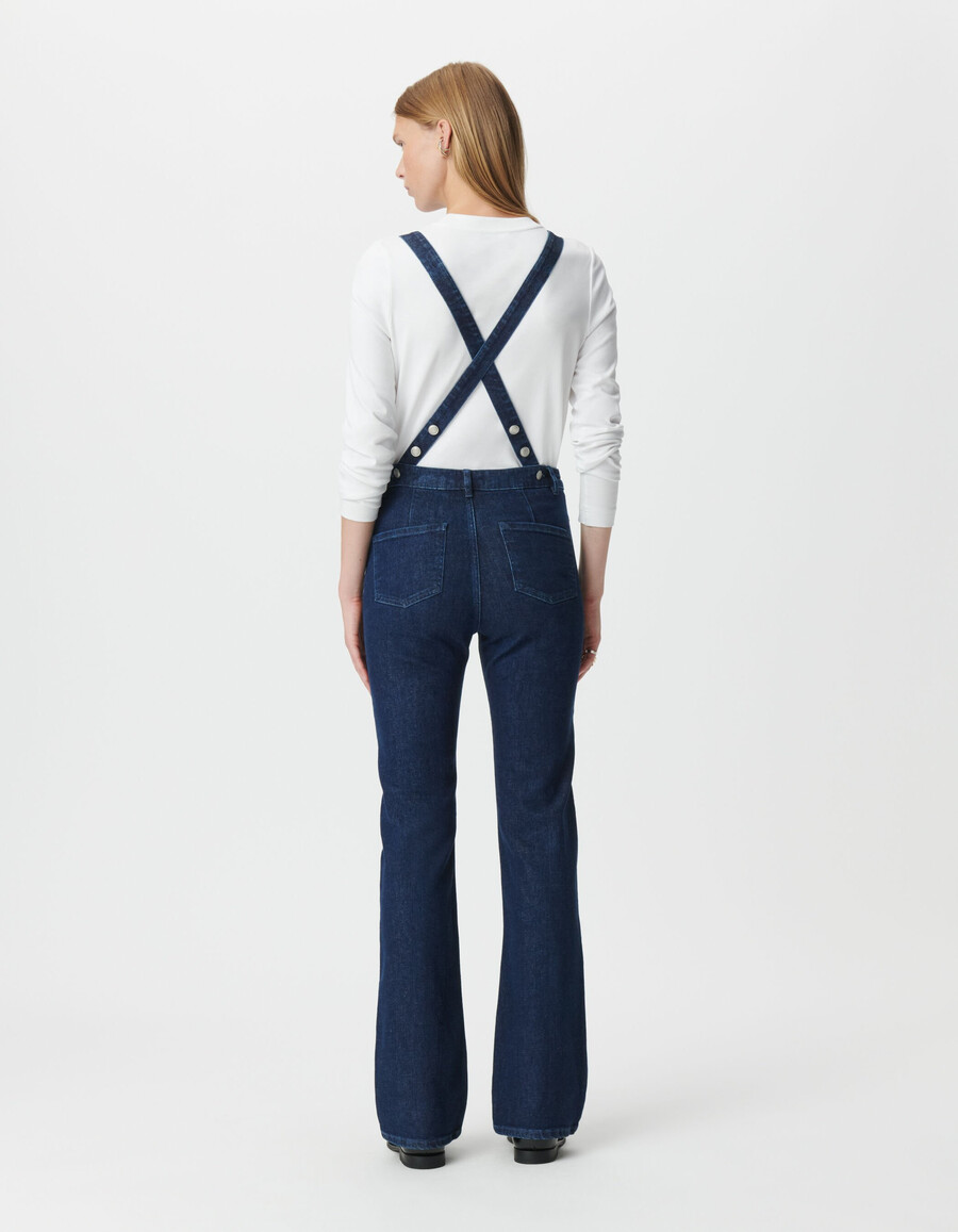 salopette da donna in denim blu con taglio a zampa