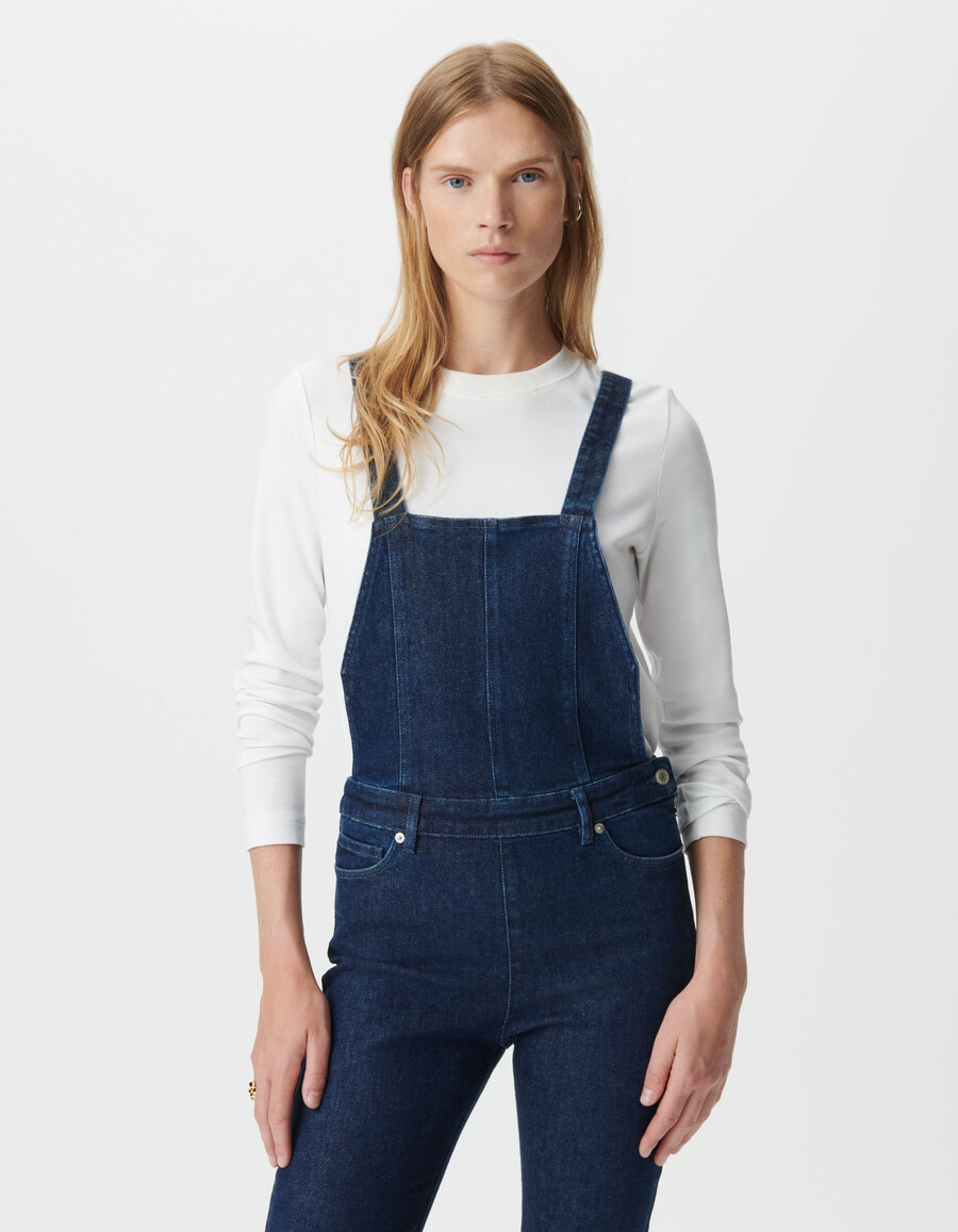 salopette da donna in denim blu con taglio a zampa