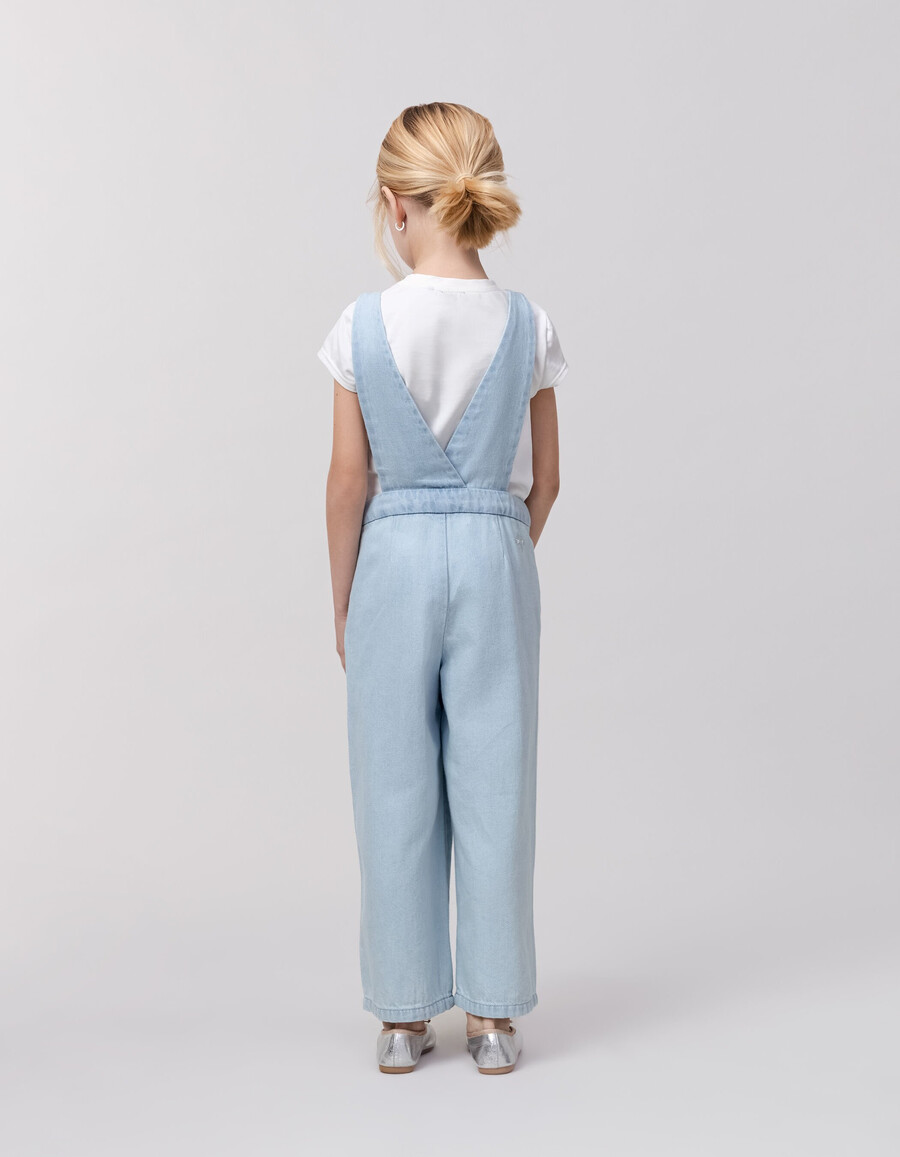 completo di salopette e maglietta in denim blu per bambina