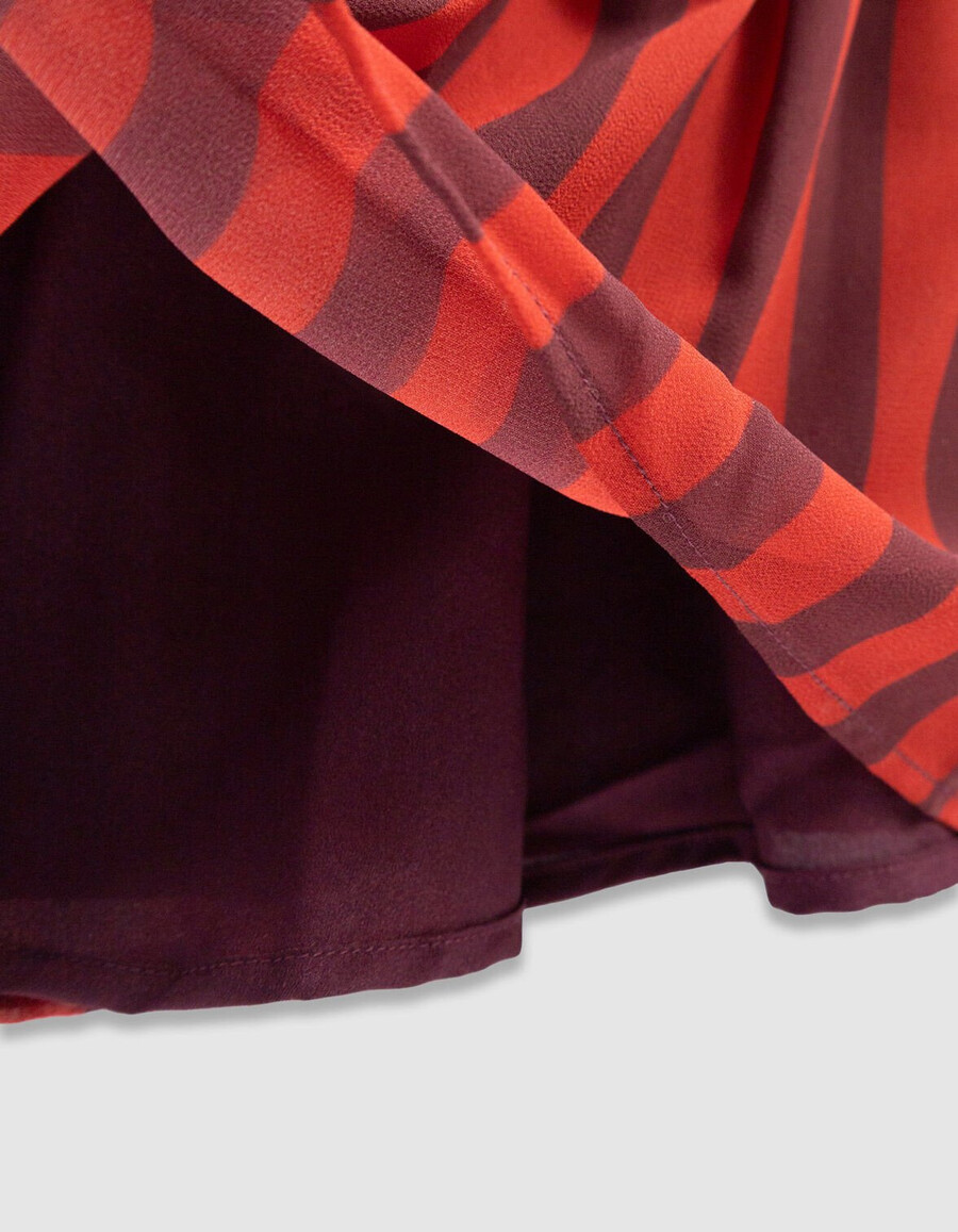 abito da bambina in maglia grigia con tessuto misto e strisce rosse