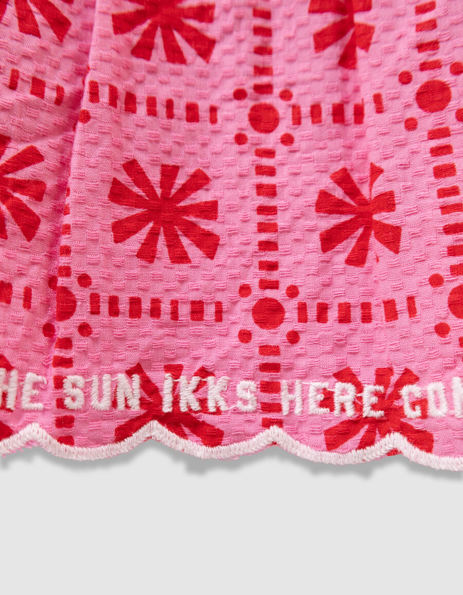 abito rosa con stampa grafica per bambine