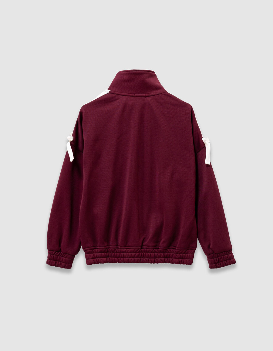cardigan bordeaux con cerniera e fiocchi ecrù per bambine