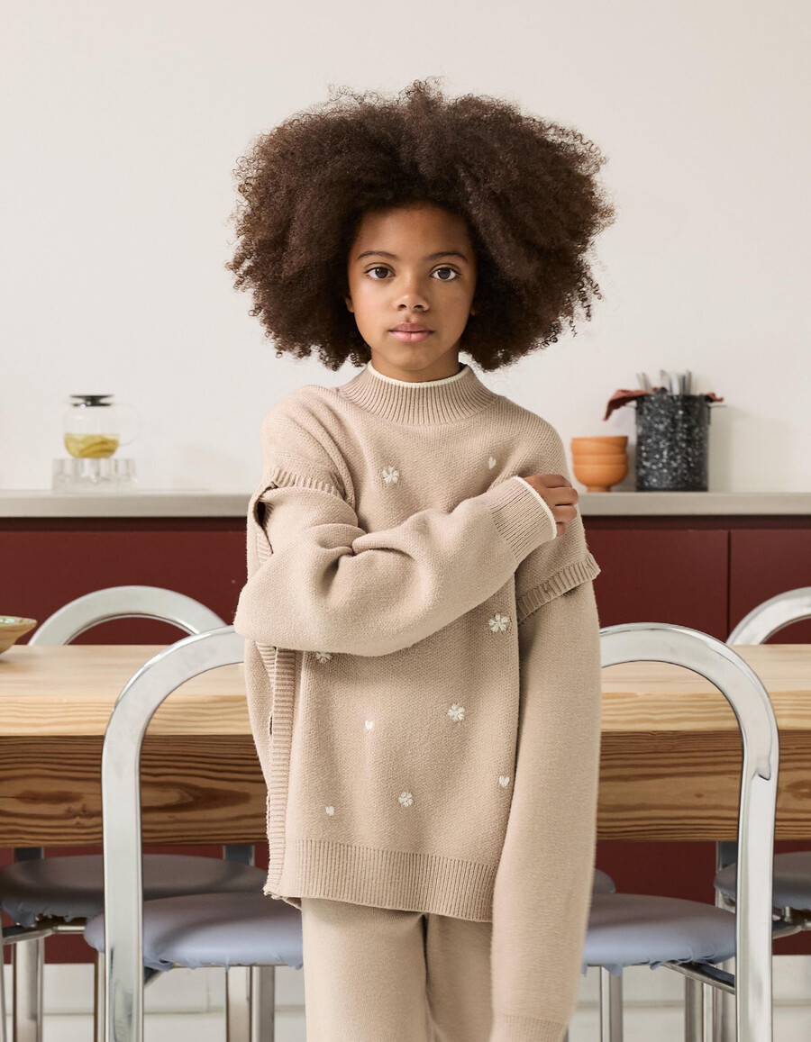 maglione beige in maglia per bambine con maniche staccabili