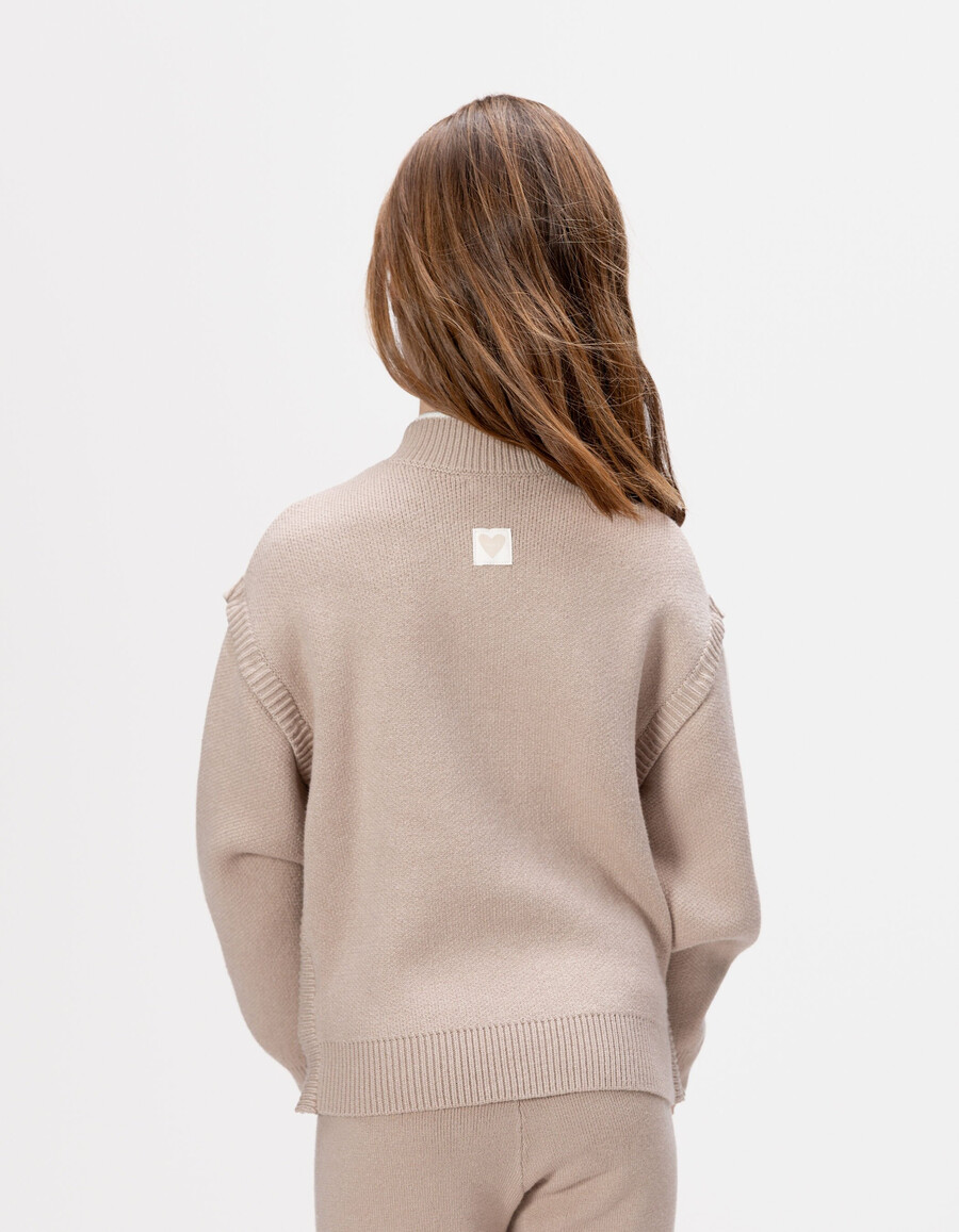 maglione beige in maglia per bambine con maniche staccabili