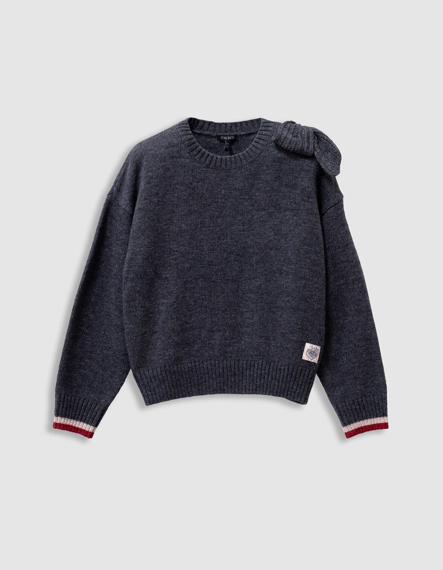 maglione grigio lavorato a maglia per bambine con fiocco xl sulla spalla