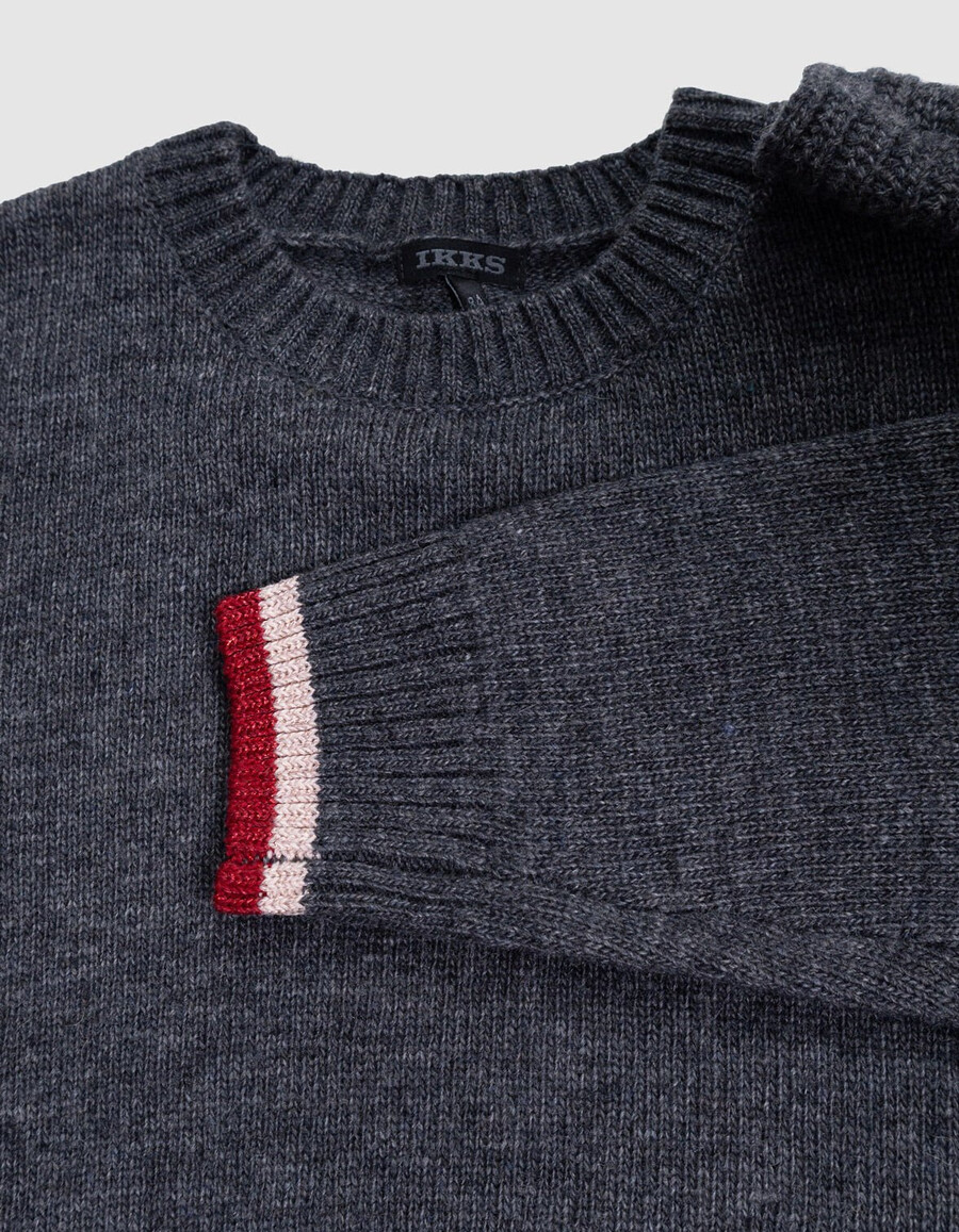 maglione grigio lavorato a maglia per bambine con fiocco xl sulla spalla