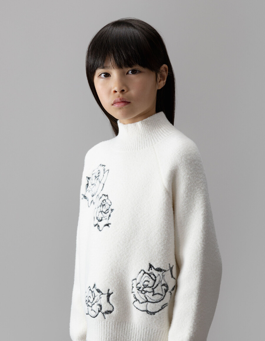maglione bianco lavorato a maglia a collo alto per bambine con ricamo di paillettes