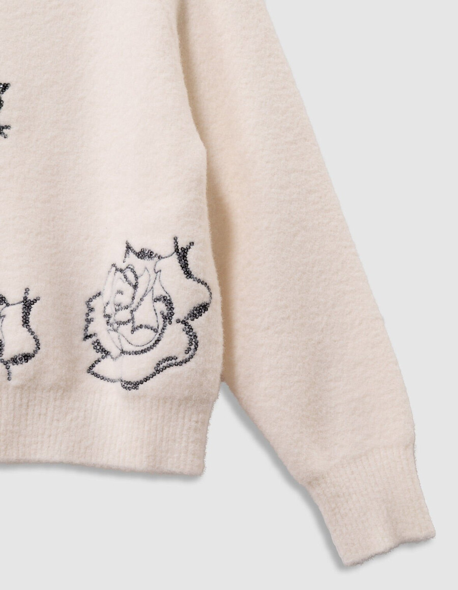 maglione bianco lavorato a maglia a collo alto per bambine con ricamo di paillettes