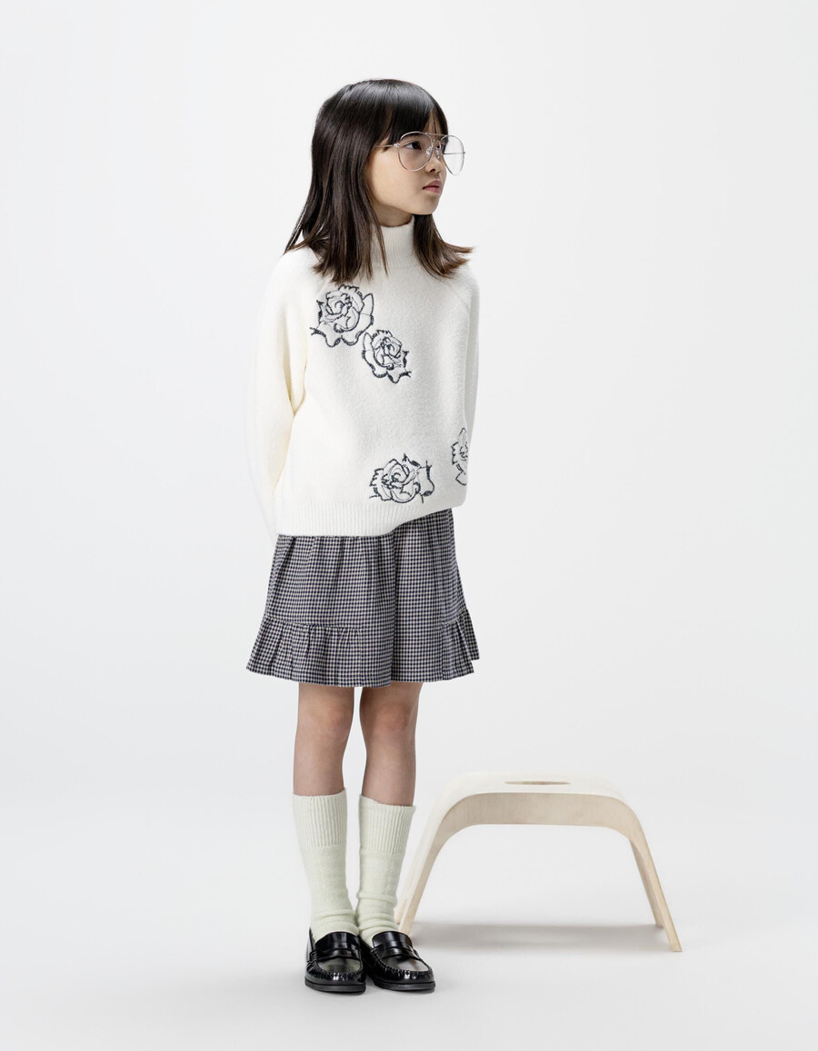 pantaloncini a quadretti blu navy con volant per bambine