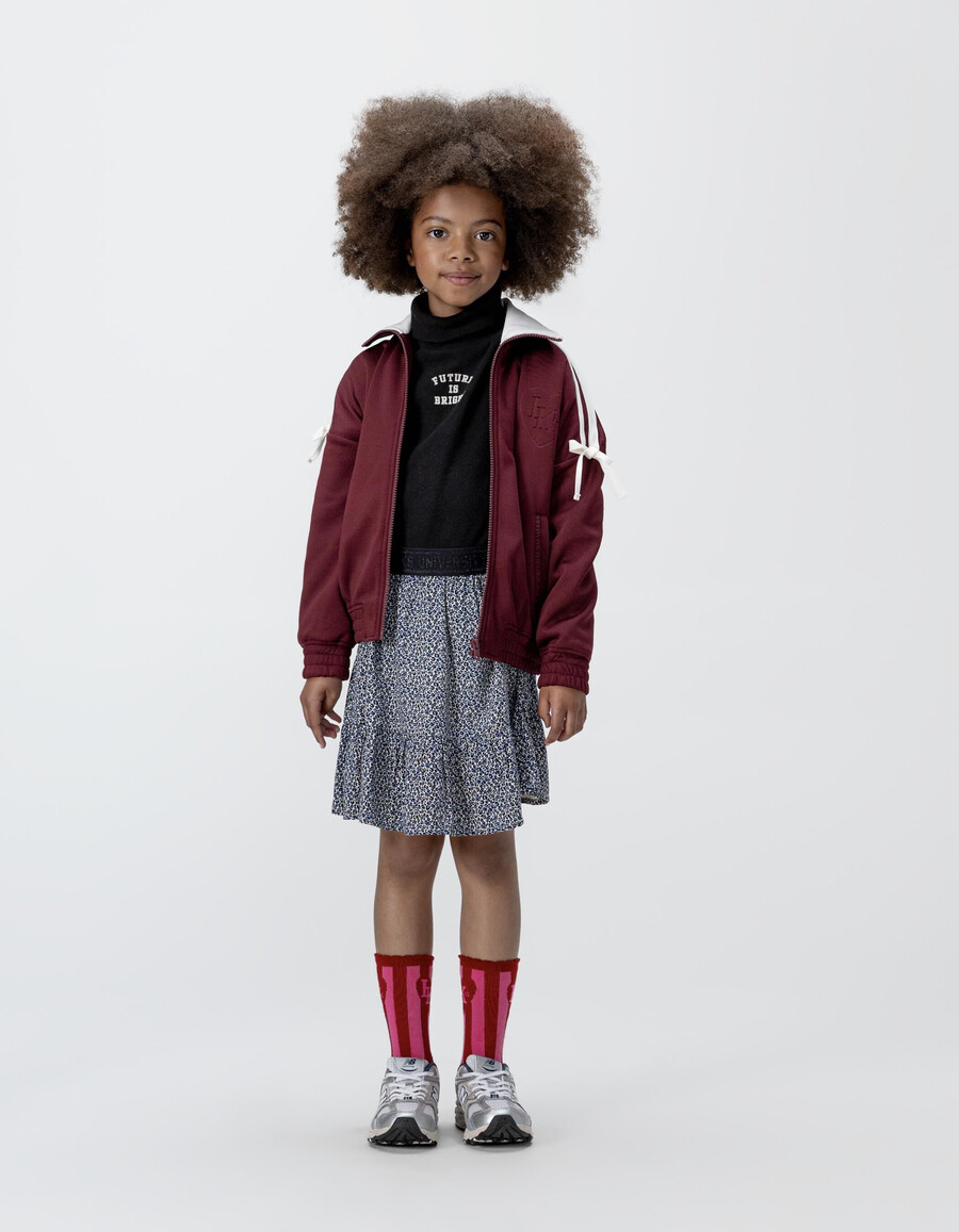 gonna corta blu navy per bambine con stampa leopardata e fiocco