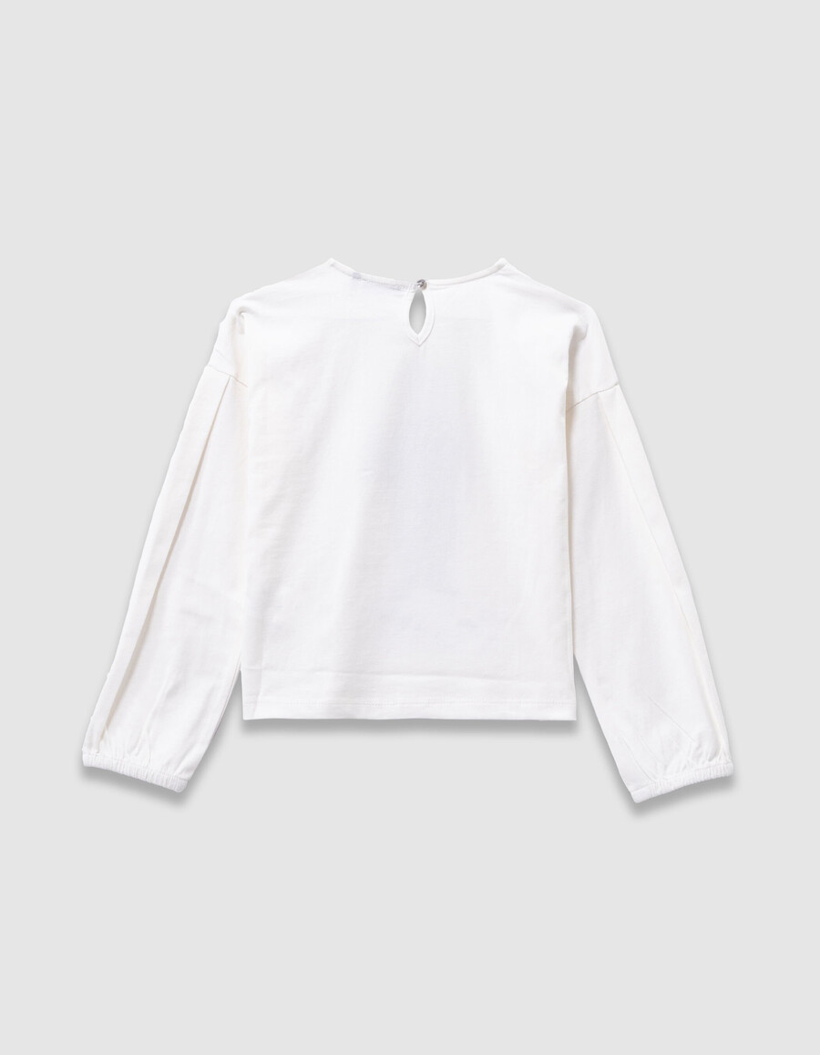 t-shirt da bambina in cotone biologico color écru con coniglio e colletto in pizzo 3d