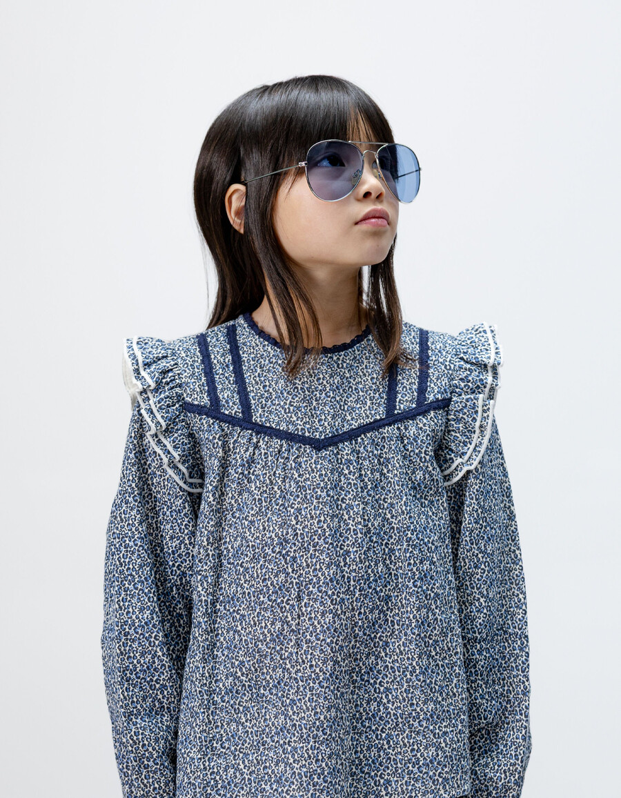 camicetta blu navy da bambina con stampa leopardata e fiocco