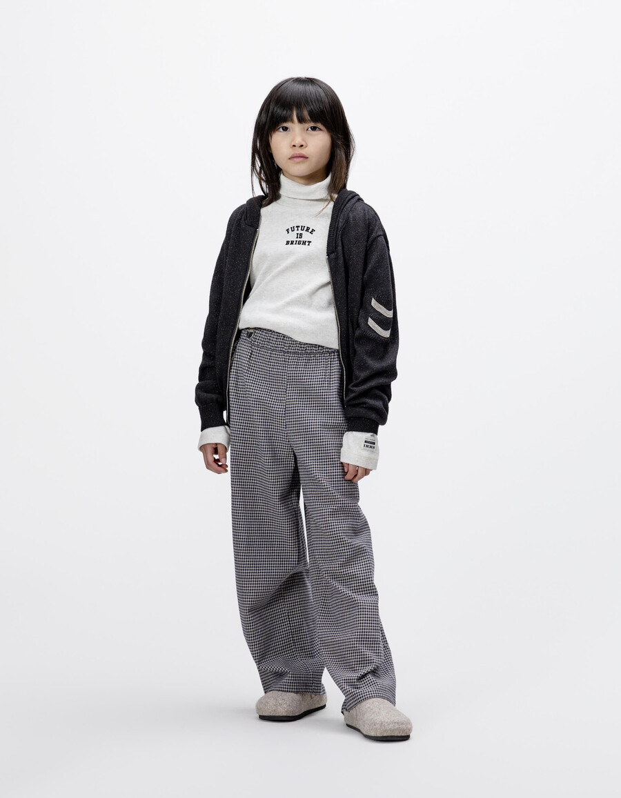 pantaloni a quadretti blu navy con volant per bambine