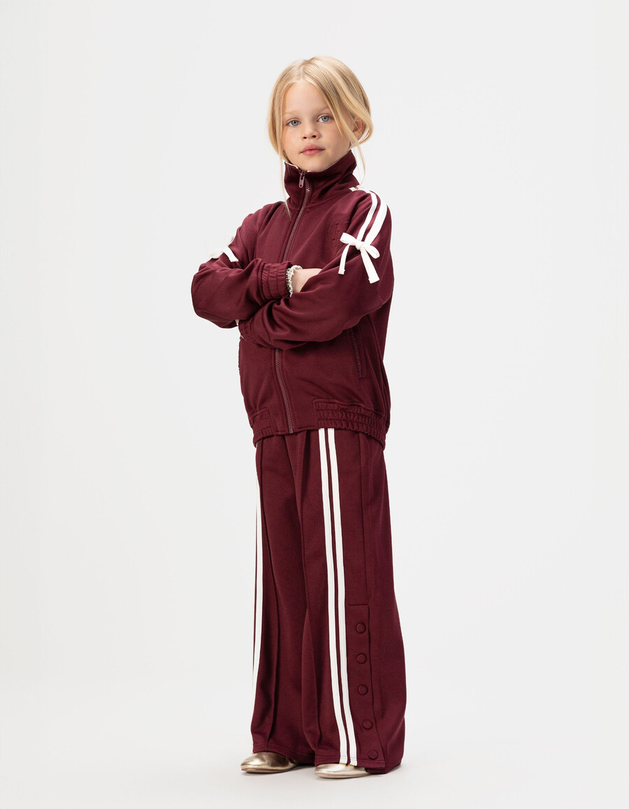 pantaloni da jogging bordeaux con strisce bianche per bambine