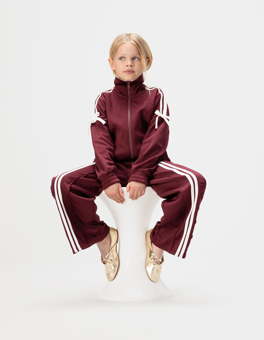 pantaloni da jogging bordeaux con strisce bianche per bambine
