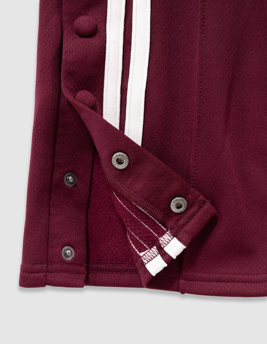pantaloni da jogging bordeaux con strisce bianche per bambine